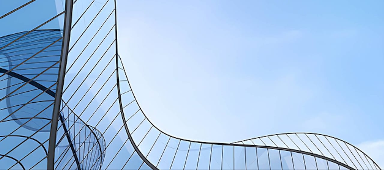 Modern glass corporate building exterior against a clear blue sky, symbolizing a forward-thinking and transparent company culture that attracts and retains top talent
