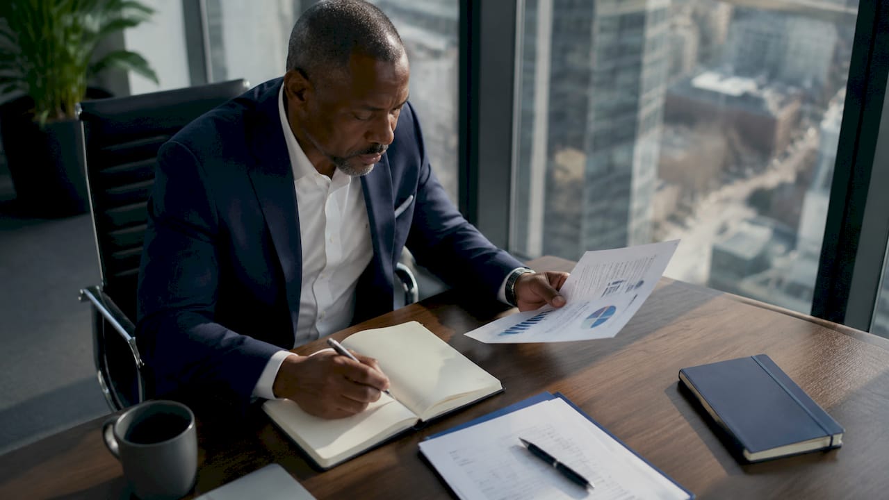 CEO analyzing employee turnover financial report