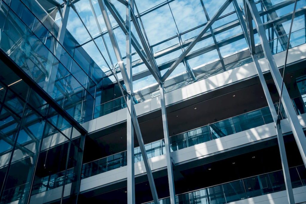 Corporate stairwell with blue light and shadows